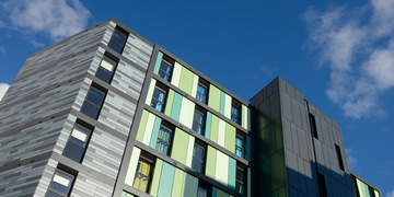 Exterior of Bainfield student accommodation in the sun