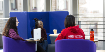 Students chatting in foyer