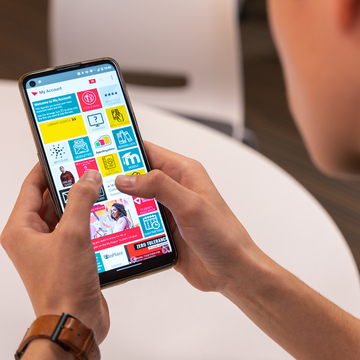 Student using myNapier app on phone