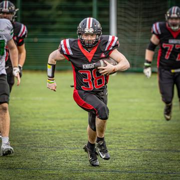 Edinburgh Napier Knights American Football player running with the ball