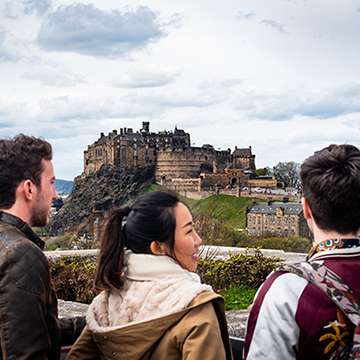 Students looking out at the view of Edinburgh Castle