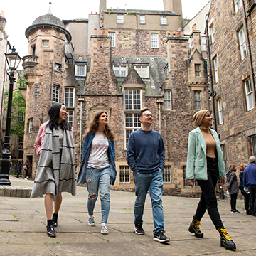 Group of international students walking in Edinburgh