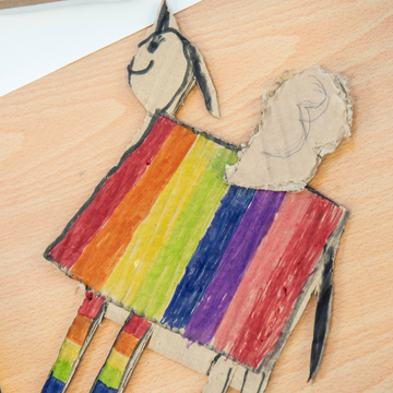 Child's art work of a rainbow-coloured horse.