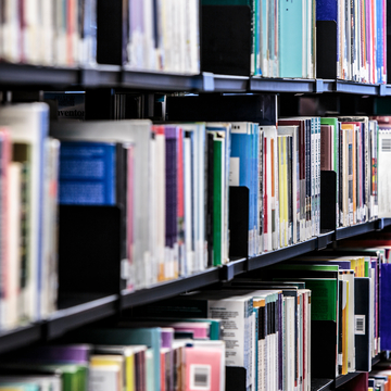Library shelves filled with lots of different books