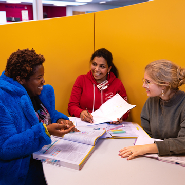 Students working together in a pod in Merchiston Library