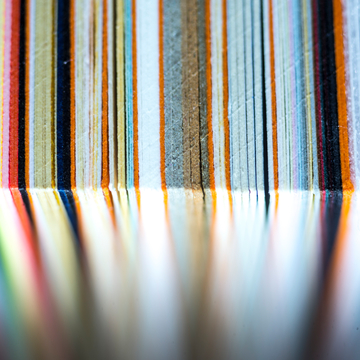 Edge of a book with coloured pages