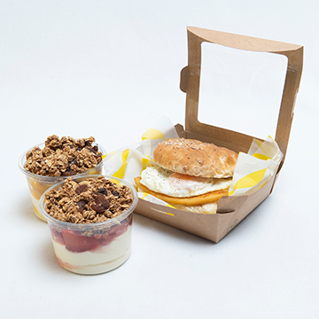 Breakfast box with egg roll and granola pots