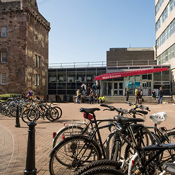 Bikes parked outside Merchiston campus in the sun