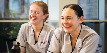 Two student nursing smiling in uniform