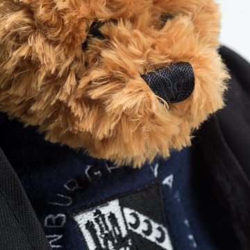 Close up of Edinburgh Napier teddy bear