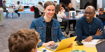 A group of students studying and talking