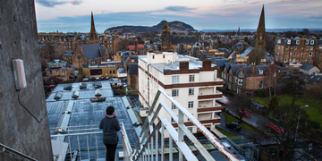 View from outside staircase over Merchiston Campus, with Edinburgh in the background